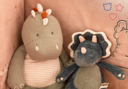 NOUKIE'S triceratops soft toy with music box