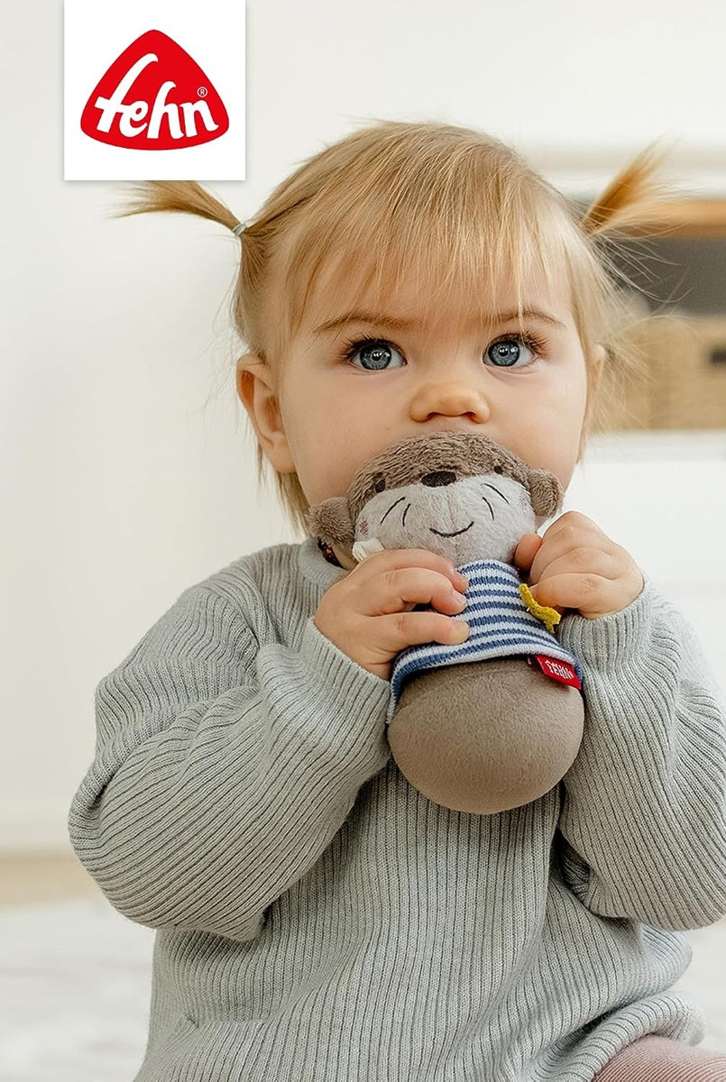 FEHN Otter roly-poly toy with a rattle, 15 cm