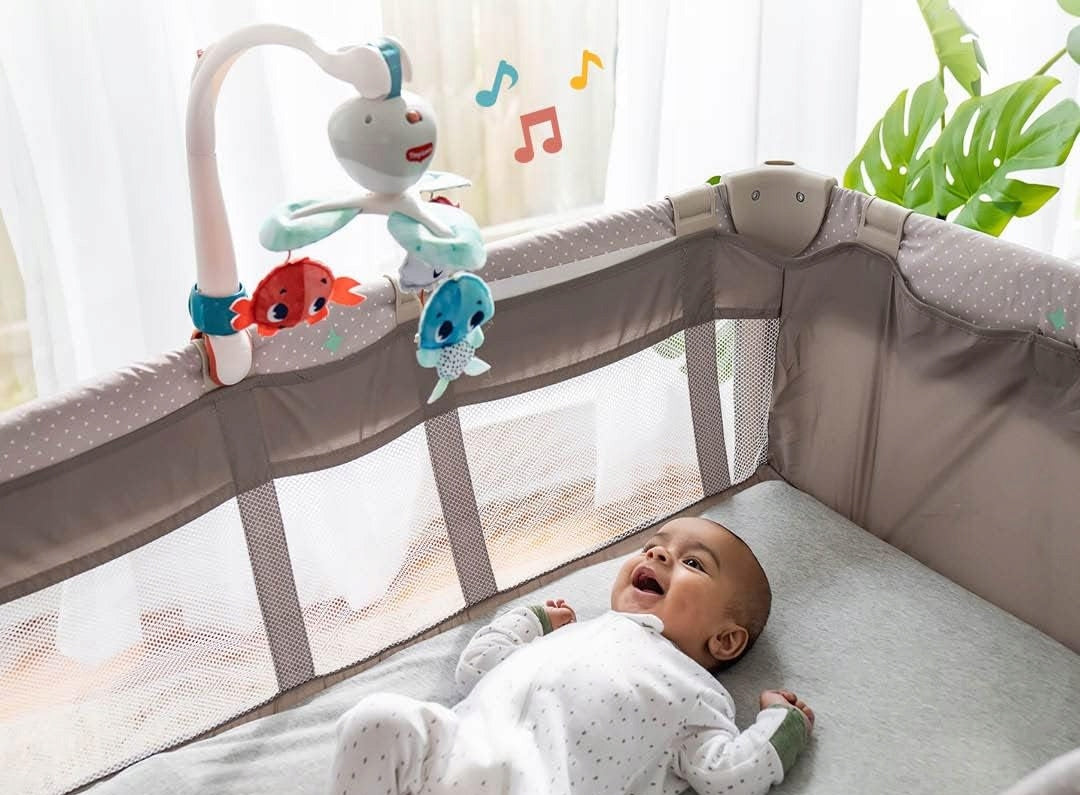 TINY LOVE Comorile Oceanului CARUSEL de călătorie 3în1