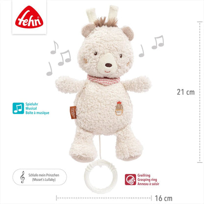 Grafika poglądowa jasnego misia z białym kółkiem, symbolami nut i liniami wymiarowymi.
