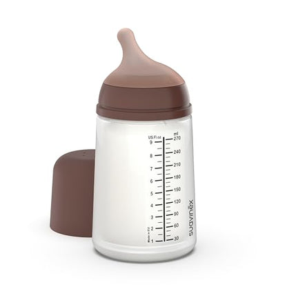 Suavinex Zero Zero Deep 270 ml — butelka z osłoną ustawioną obok
