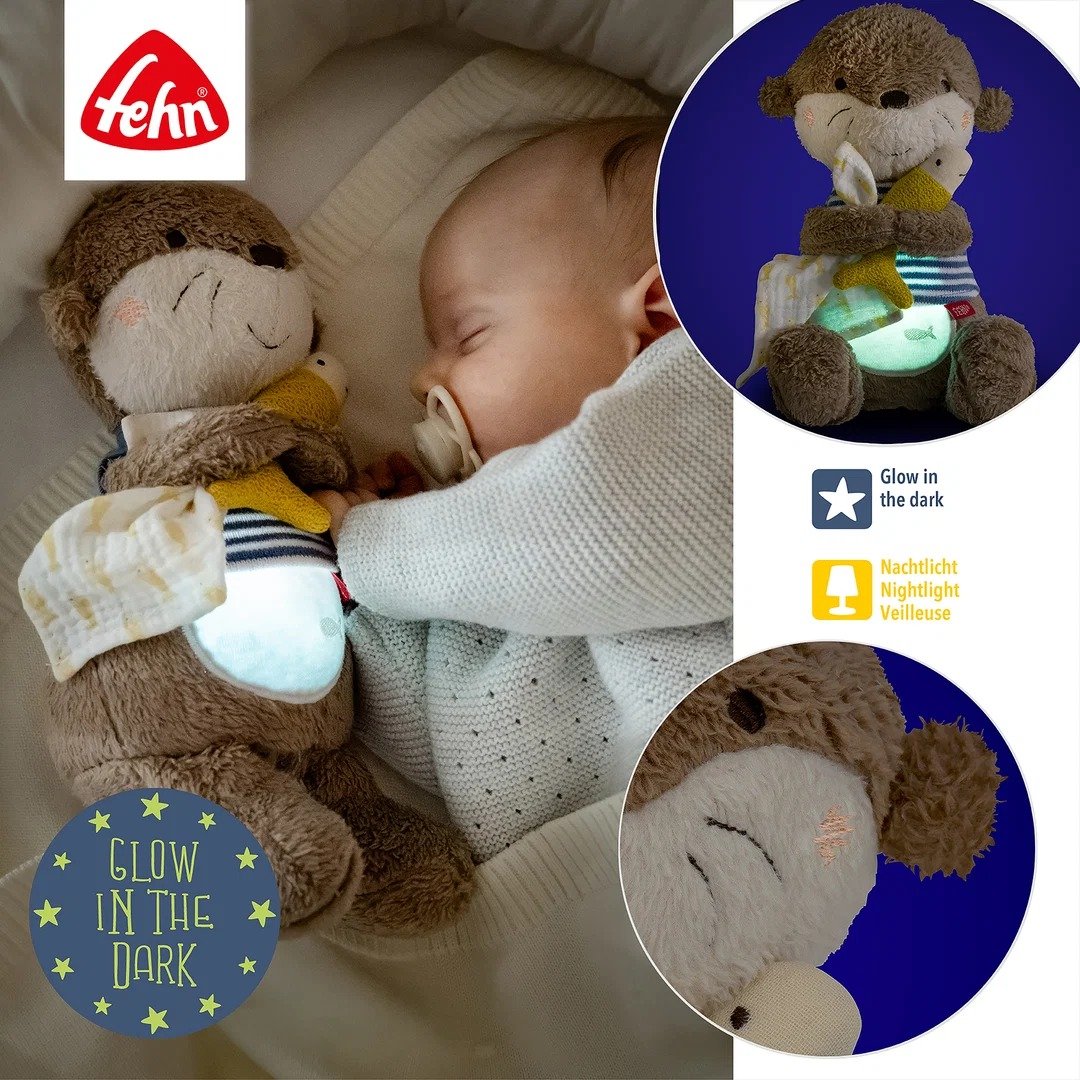 Fehn Otter lampka nocna i przytulanka z funkcją glow in the dark dla niemowląt