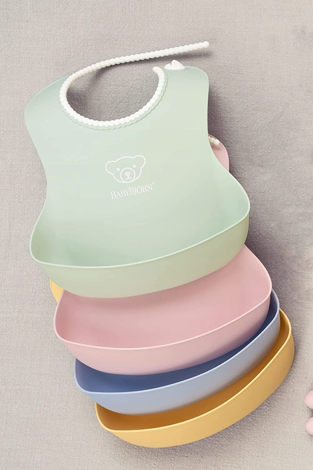 BABYBJORN silikonesmæk med lomme x2