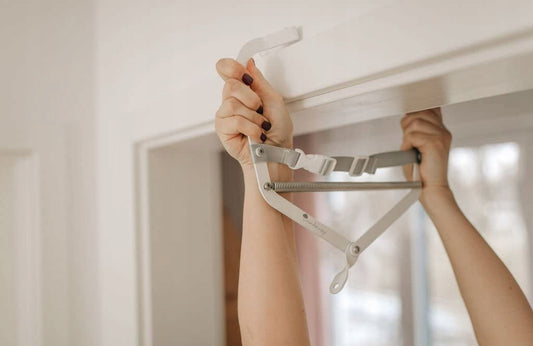 WUNDERWIEGE klamra do kołyski sprężynowej i hamaka dziecięcego 15 kg, biała, metalowa, montaż na framudze