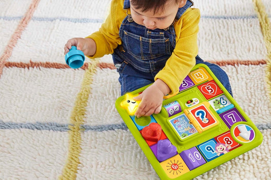 FISHER-PRICE HRB74 interaktywna plansza do gry 40 dźwięków J. NIEMIECKI