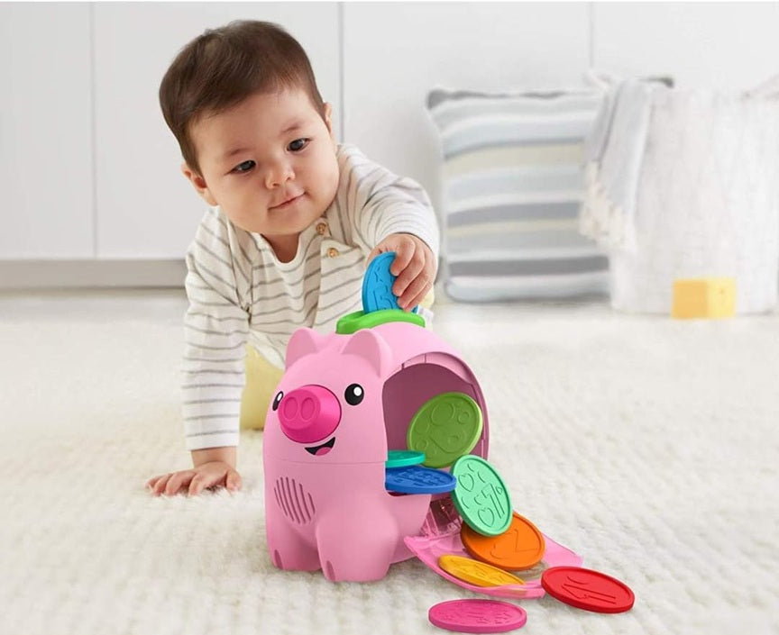 FISHER-PRICE tirelire interactive cochon mouvement et sons J. ANGLAIS