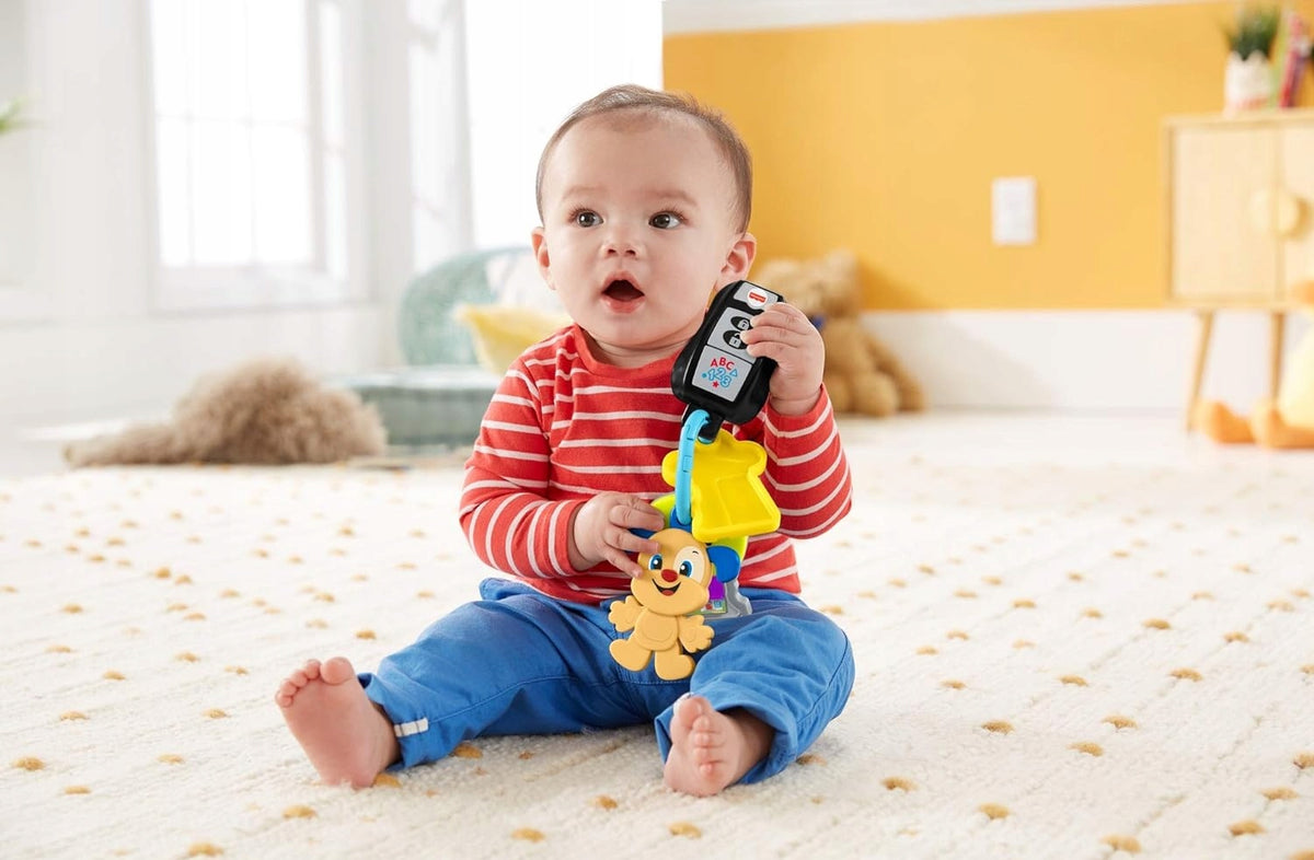 FISHER-PRICE chei auto interactive cu breloc J. GERMANĂ